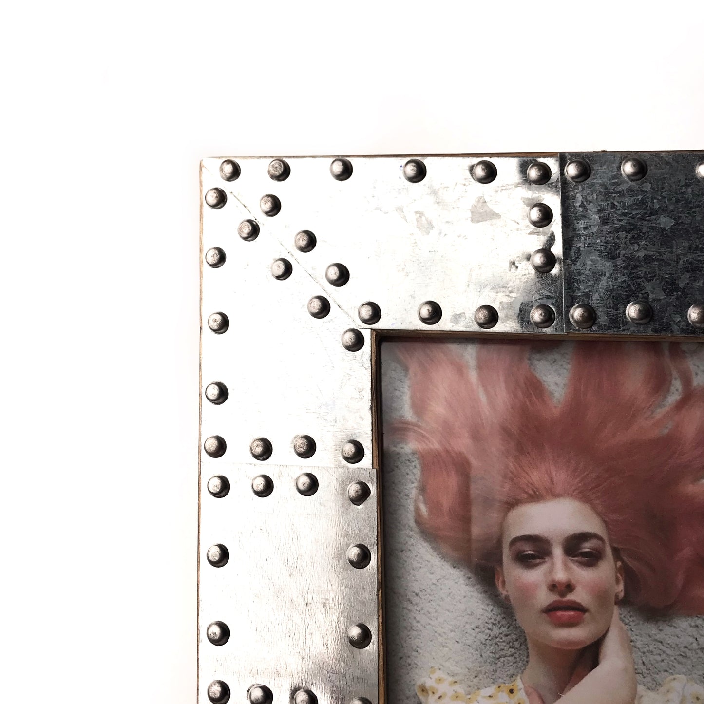 Detail of an industrial style metal picture frame